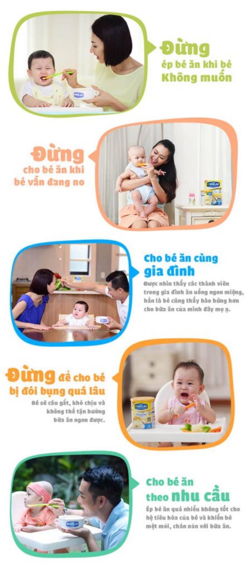 Em bé đang hào hứng ăn sữa chua Vinamilk ít đường trong bữa ăn dặm, thể hiện sự thích thú và ngon miệng